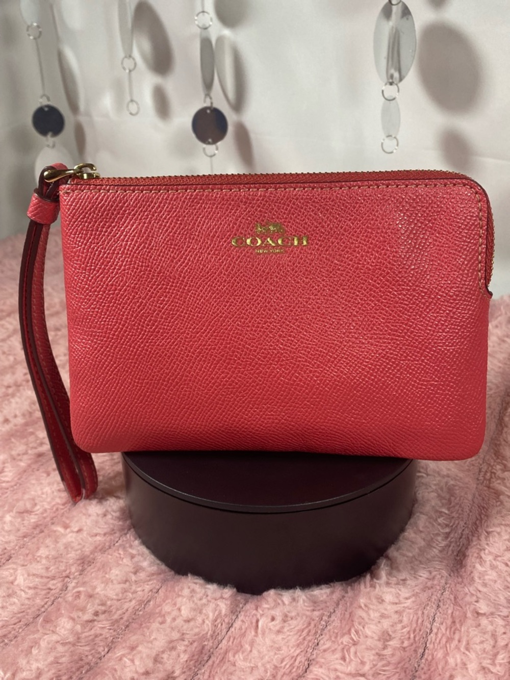 Coach Coral/Pink Pebbled Leather Wristlet with Gold Logo
